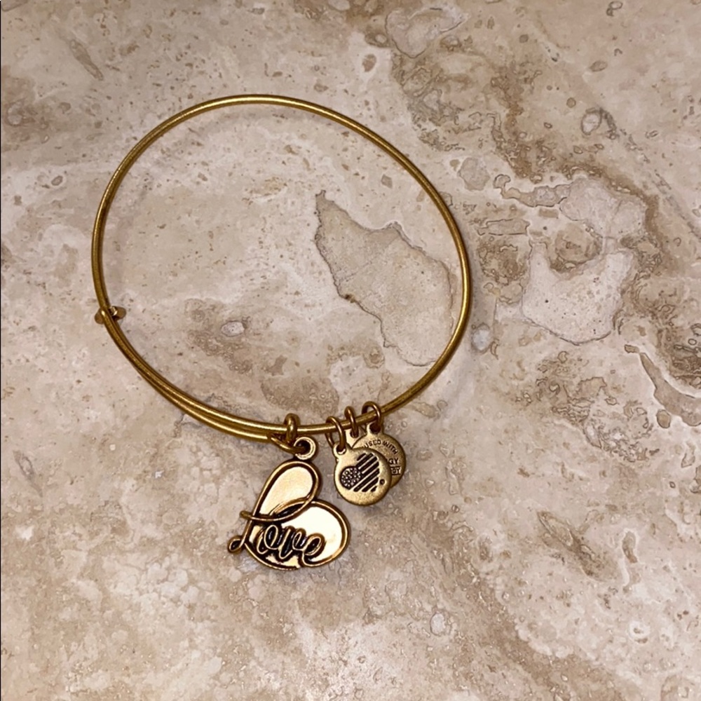 Alex and Ani gold “love” charm bracelet. Like new